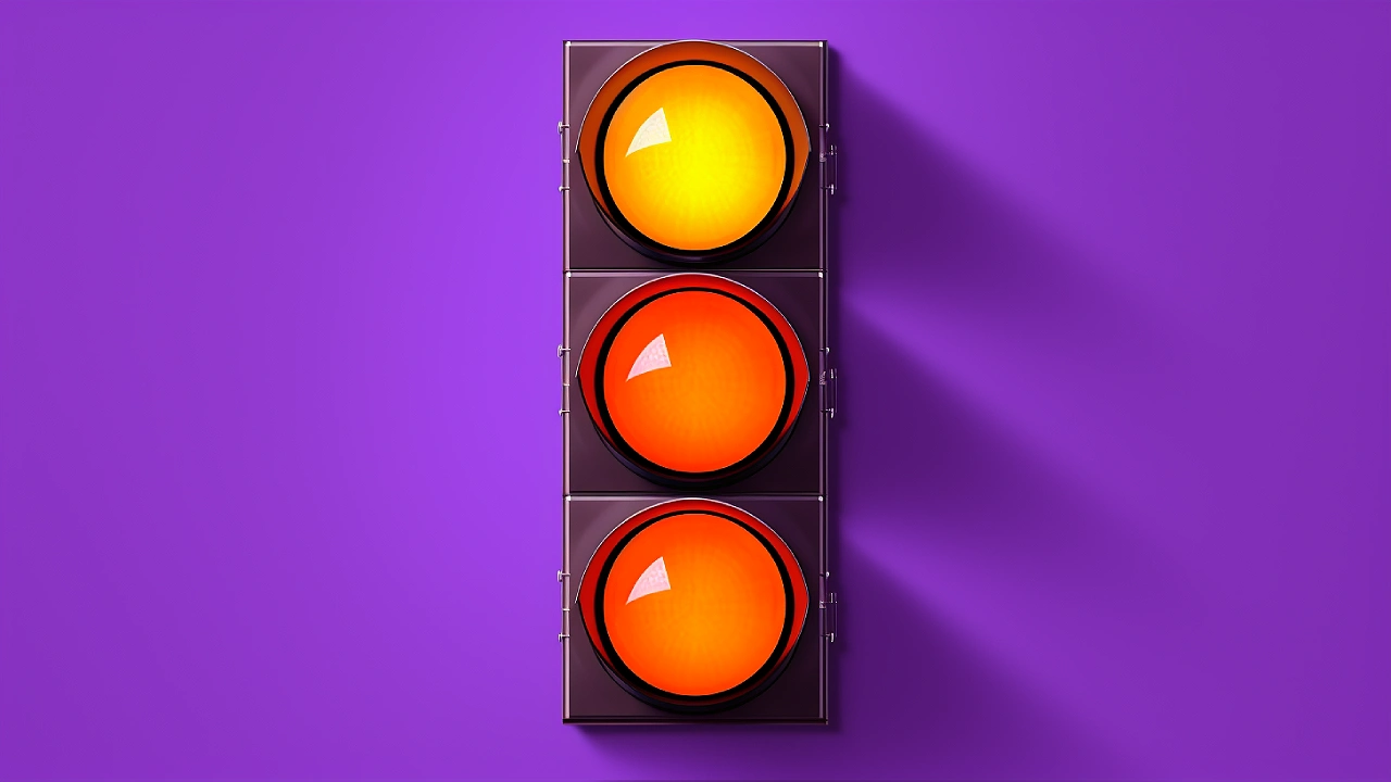 Three-light signal showing yellow and red indicators