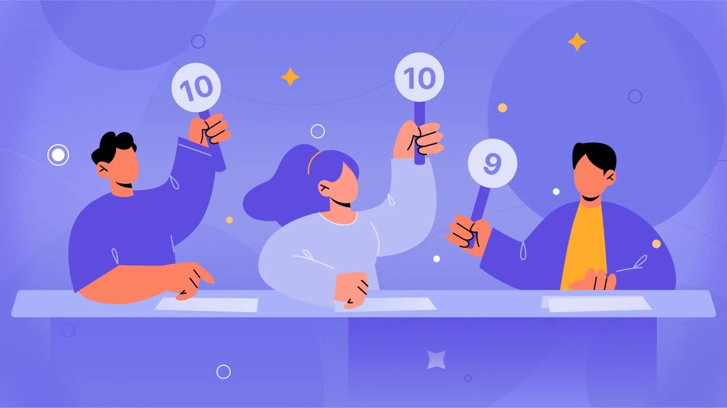 An image of three people raising their score cards.